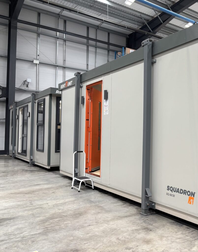 Secure plastisol site office cabins on hire inside logistics warehouse