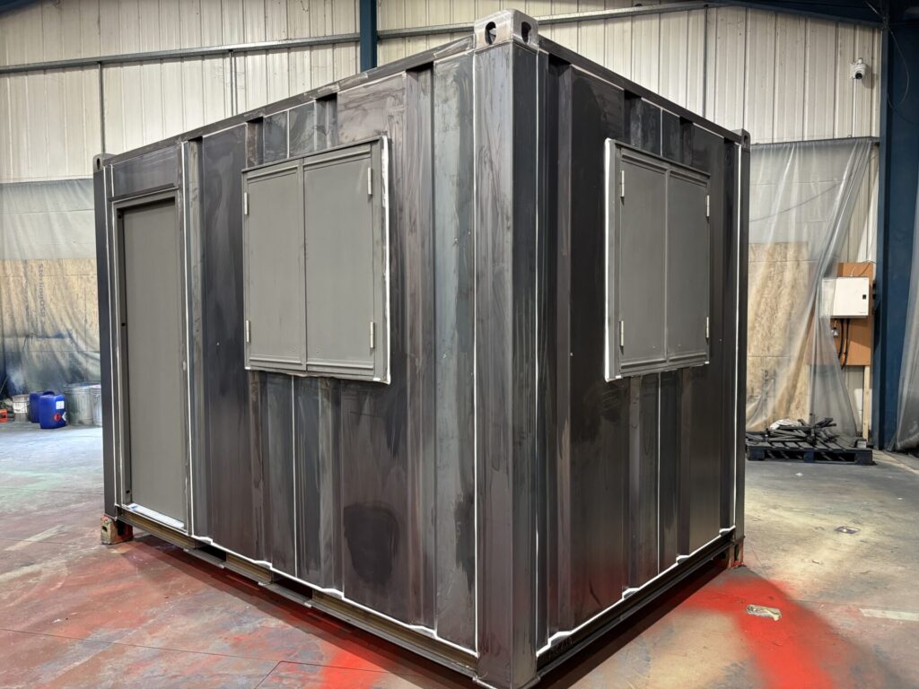 Insulated portable office cabin with Kirncroft shutters and steel door