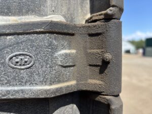 rease nipple fitted to a one-trip shipping container door hinge for smooth operation