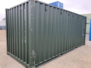 Rear and side view of a one-trip 20ft Bottle Green shipping container showing cosmetic corner pillar scratching, corrugated steel panels and excellent overall condition.
