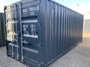 Brand new light grey 20ft one-trip ISO shipping container KNG72387 viewed from the front and side in the ContainerKingยฎ depot, Lincolnshire.