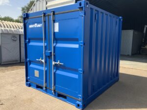 "Professionally refurbished 7ft x 8ft ISO steel storage container in RAL 5010 blue with compact footprint and genuine ISO construction."